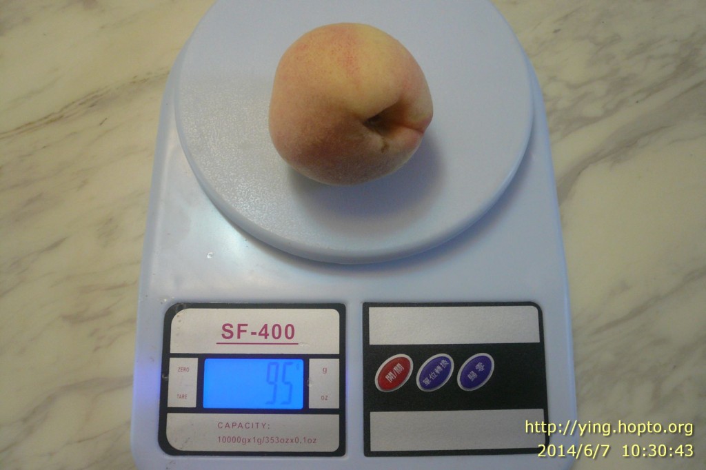 秤一下水蜜桃重量：95公克